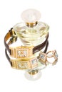 Golden jewellery and perfume