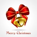 Golden jingle bell with red ribbon Royalty Free Stock Photo