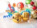Golden jingle bells for christmas decoration. Royalty Free Stock Photo