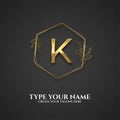 Golden K letter logo template with leaf line art style Royalty Free Stock Photo