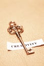 Golden key for creativity Royalty Free Stock Photo