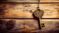 Golden key hanging from chain on top of wooden wall with key in the shape of tree. Generative AI Royalty Free Stock Photo