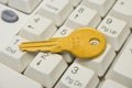 Golden key on keyboard Royalty Free Stock Photo