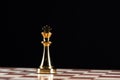 Golden king chess figure on chessboard