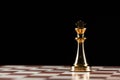 Golden king chess figure on chessboard