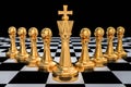 Golden King with golden pawns - chess teamwork concept Royalty Free Stock Photo