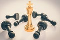 Golden King and many fallen pawns - chess leadership concept Royalty Free Stock Photo