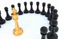 Golden King surrounded by black pawns - chess trap concept Royalty Free Stock Photo