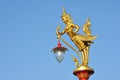 Golden Kinnaree lamp on electricity