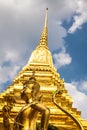 Golden Kinnari statue at Temple of Emerald Buddha (Wat Phra Kaew) in Grand Royal Palace. Bangkok, Thailand Royalty Free Stock Photo