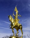 Golden lady on a golden horse