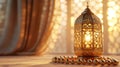 A golden lantern with intricate designs sits on a table with a string of prayer beads in front of it. The lantern is lit and glows Royalty Free Stock Photo