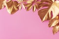 Golden leaf decoration design background. Vintage gold, luxury and trendy natural beauty minimal concept on pink top view