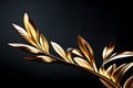 golden leaves of a tree branch on black background isolated closeup, decorative gold color plant sprig, yellow shiny reflective Royalty Free Stock Photo