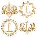 Golden letter L vintage monograms set. Heraldic monogram in coats of arms form, letter L in floral round frame, letter L in wreath