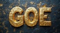 Golden letters GOE on dark background Royalty Free Stock Photo