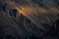 Golden Light Blankets Cliffs In Rocky Mountain Royalty Free Stock Photo