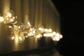 Golden light bulbs on the night dark background. City lights. Bokeh soft abstract background. Bokeh - Image Royalty Free Stock Photo