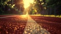 Golden light casts a warm glow over the empty track, creating a peaceful atmosphere perfect for evening workouts Royalty Free Stock Photo