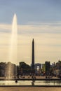 Golden light on the fountain pond in jardin des tuileries central paris