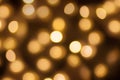 Golden lights bokeh blurred background, abstract beautiful blurry silver Christmas holiday party texture, copy space Royalty Free Stock Photo