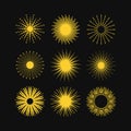 Golden like abstract isolated round sunburst decorative icons and design elements set on black Royalty Free Stock Photo