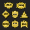 Golden like different shapes retro and vintage labels and badges icons banners set on black Royalty Free Stock Photo