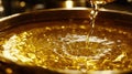 Golden Liquid Cascade Pouring Viscosity and Radiance in Motion Dazzling with Light and Reflection Royalty Free Stock Photo