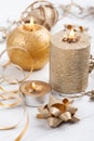 Golden lit aroma candles and Christmas toys