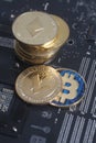 Golden Litecoin,Bitcoin,Ethereum on motherboard digital cryptocu