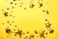 golden little star on yellow background for merry Christmas generated by AI tool Royalty Free Stock Photo