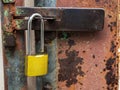 Golden lock at the rusted steel door Royalty Free Stock Photo