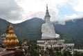 Golden Lotus and White buddhism Sit and Meditation architecture with Background mountain and cloud wild view thailand