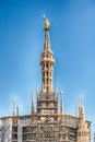 Golden Madonna statue on top of Milan Cathedral, Italy