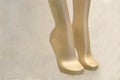 Golden mannequin legs