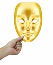 Golden mask in hand