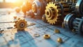 Golden mechanical gears and components rest on technical blueprints. Precision engineering parts arranged in bright workshop Royalty Free Stock Photo