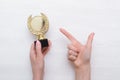 Golden medal trophy in hand. Royalty Free Stock Photo