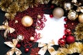 Golden Merry Christmas and Happy New Year Decoration. Red and gold Bauble on Christmas black background. Winter time Royalty Free Stock Photo