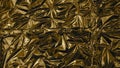 Golden metal foil, wrinkled and shiny. Close-up, abstract image background