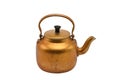 Golden metal kettle on a white background.Teapot