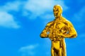 Hollywood Golden Oscar Academy award statue. Success and victory concept.