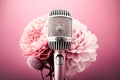 Golden metal microphone decorated with pink flowers, pink bright background, copy space. Grunge, nostalgia Royalty Free Stock Photo