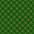 Golden metallic ornament on green background. Royalty Free Stock Photo