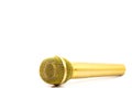 Golden Microphone on isolated white.