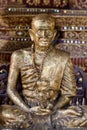 Golden monk statue Royalty Free Stock Photo
