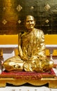 Golden monk statue Royalty Free Stock Photo