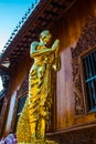 Golden monk statue at Thai temple Royalty Free Stock Photo