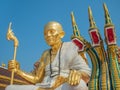 Golden Monk Statue and Three Heads Serpent Royalty Free Stock Photo