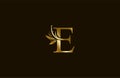 Golden Monogram Flourishes Letter E Logo Manual Elegant
